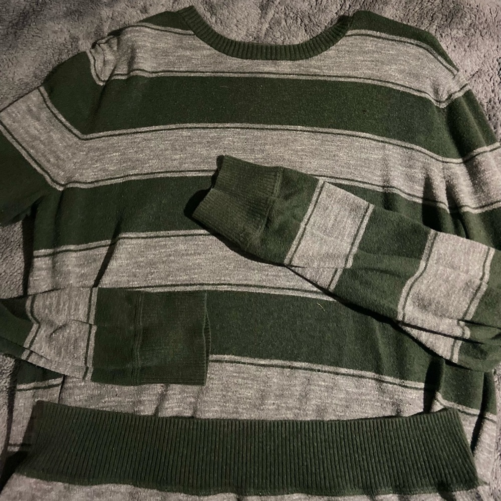 grey and green grunge sweater